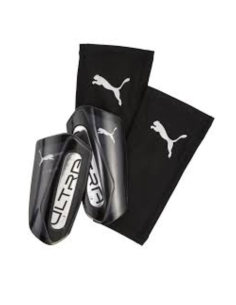 Puma ultra espinilleras flex negro